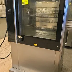 Fri-Jado TDR7-P rotisserie oven. Features pass-through glass doors, stainless steel construction, digital controls, and internal hanging baskets. Moun
