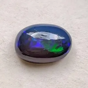 Natural Welo Black Opal 2.45ct Oval Cabochon