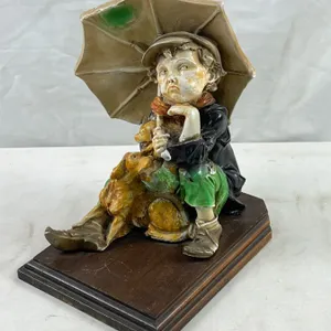 Limoges Creations Ltd. Boy and Dog Porcelain Figurine
