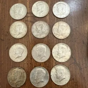 12+/- 1964 Kennedy Half Dollars