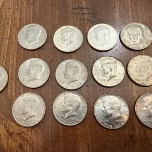 13+/- Kennedy Half Dollars