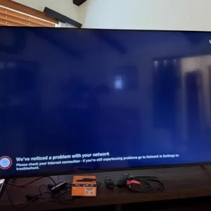 Approx. 64" Vizio TV, Roku Device, Wifi Extender,