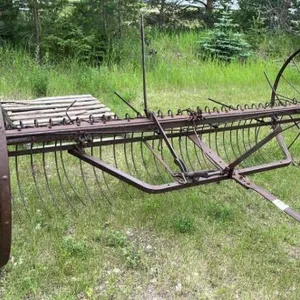 Yard Art Vintage Steel Dump Rake w/52" Wheels.