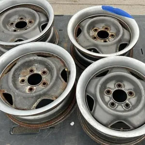 Set a Four 15" Chevrolet Rims w/Beauty Rings. #C