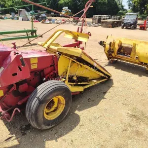 New Holland 718 Harvester with hay head