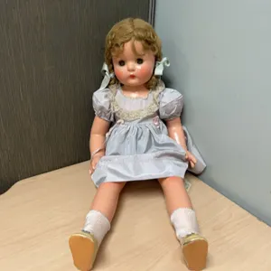 Mid-20th Century Hard Plastic Doll With Blonde Braids, Lace Dress, And Original Shoes, 24 Inches Tal