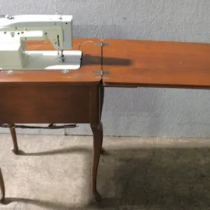 White Zig Zag Sewing Machine with Cabinet