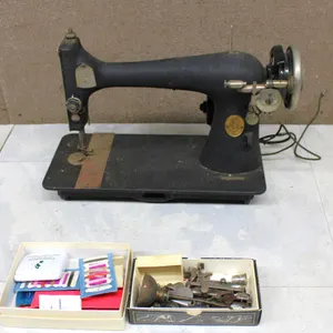 Singer Sewing Machine with Accessories