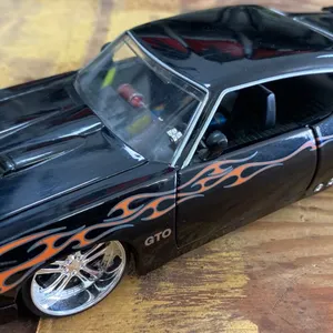 Bigtime Muscle 1969 Pontiac GTO Diecast Model Car