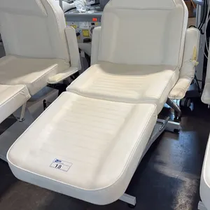 WHITE ELECTRIC FULLY ARTICULATING SALON/SPA TREATMENT CHAIR - STAIN AND TEAR PRESENT