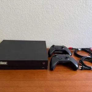 Black Xbox One X & Controllers