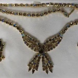 Unsigned crystal necklace and clip on earrings