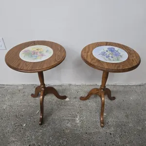 Two Wooden tilt top tri leg tables with embedded