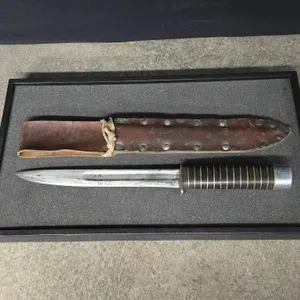 Knife with leather sheath