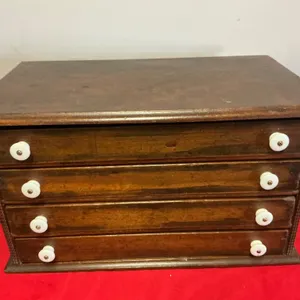 Antique Spool Wood Four-Drawer Chest