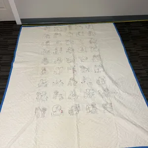 Hand-Embroidered Child’s Motif Quilt With Blue Border, Cotton, Storybook Animals & Figures