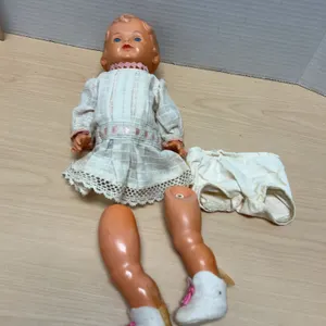 Early 20th Century Composition Baby Doll With Blue Eyes, Original Dress, And Detachable Limbs, 15 In