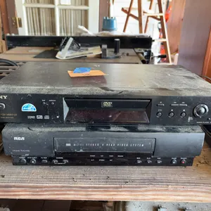 Sony DVP-NS300 CD/DVD Player and Thomson Consumer Electronics Video Cassette Recorder (VCR) model VR