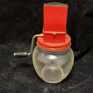 Red and Glass Countertop Hand-Crank Nut Grinder with Floral Motif, Metal Hopper and Jar Body c. Mid-