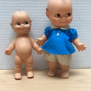 Cameo Kewpie Dolls Including Original Cloth Outfit, Marked Backs, Circa Mid-20th Century