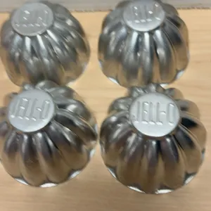 Four JELL-O Embossed Metal Individual Dessert Molds with Fluted Sides, Early to Mid 20th Century