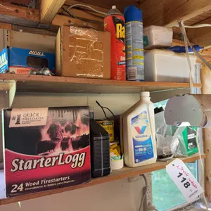 Assorted Garage Shelf Contents with Motor Oil and Fasteners