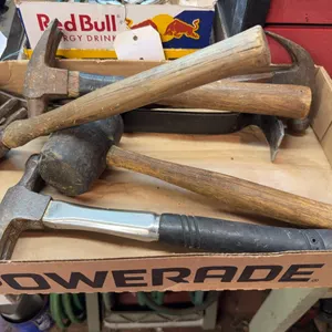 Assorted Hand Tools Including Claw Hammers and Mallet