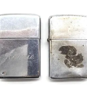 (2) Zippo Lighters 
- one is dented