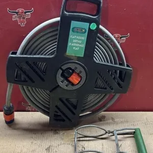 Flat Coiling Garden Hose & Canning Tongs.