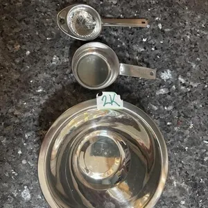 7 inch stainless bowl, measuring cup and sifter