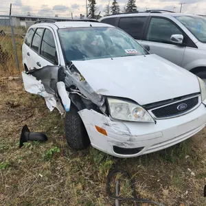 SALVAGE UNIT: 2007 Ford Focus Car (White)
 UNRESERVED