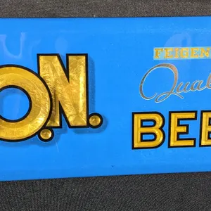 CELLULOID OVER TIN SIGN FEIGENSPAN P.O.N. BEER