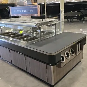 2018 Wasserstrom C/C AA0109-01-64 10-well hot food warmer island. Features gray wood-grain laminate base, overhead sneeze guard with warmer, integrate