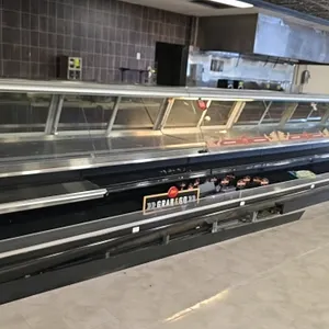2008 Barker 28' slant glass deli service case lineup. Composed of (2) 8' sections and (1) 12' section. Features a self-serve lower front grab-and-go d