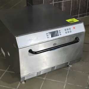 2008 TurboChef HHB High h Batch rapid cook countertop oven. Features stainless steel construction, digital control panel, and front-loading pull-down 