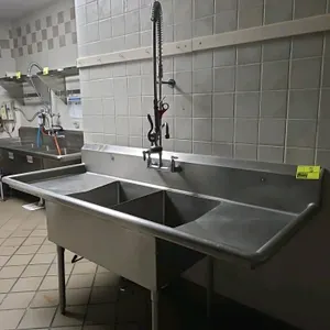 Unbranded 6½' stainless steel 2-compartment sink. Features two 18"W x 24"D x 11"D sink bowls, 1½'W x 2½'D left and right drainboards, a backsplash-mou