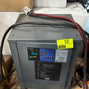 GNB SCR 200 commercial battery charger, model SCR20018750T1H. Features digital display panel, basic operation guide on front, and attached charging ca
