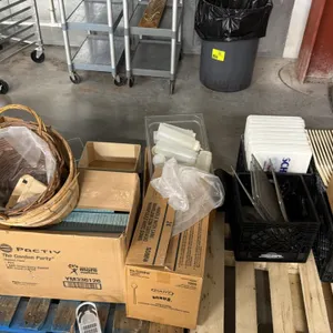 Assorted food service and bakery supplies. Includes wooden and woven display baskets, molded fiber berry baskets, plastic squeeze condiment bottles, m