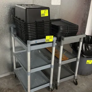 3-tier poly utility cart. Features gray plastic shelves and aluminum support posts. Mounted on swivel casters. Note: Totes, lids, and all shelf conten