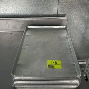 Aluminum full-size sheet pan. Features wire-reinforced beaded rim. 26"L x 18"W.