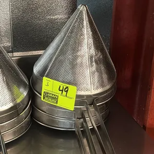 Stainless steel cone sifter. Features a perforated conical basket with an integrated handle and a helper hook for resting on pot rims.