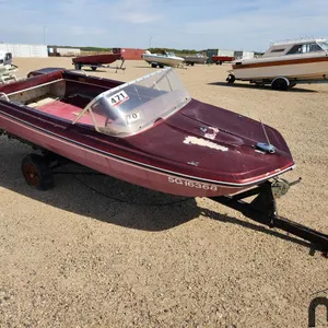 SALVAGE UNIT: Ex-El Explorer Boat w/ 45 McCulloch Motor & Trailer (Non-Runner)
 UNRESERVED
