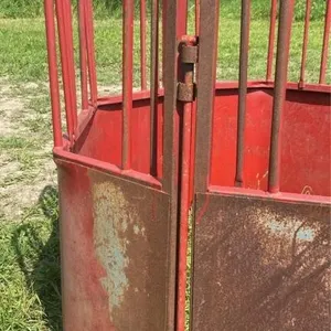Red round bale feeder