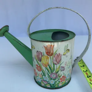 Vintage Ohio Art tin litho toy watering can w/ a floral design with tulips and bees