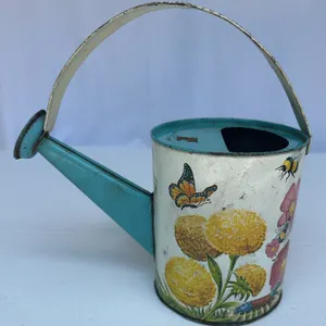 Vintage U.S. Metal Toy Manufacturing Co. watering can from the 1950s