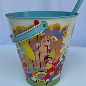 Vintage metal sand pail manufactured by the Ohio Art company from the 1940s
