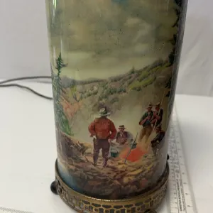 Vintage 1950s L.A. Goodman motion lamp featuring a camping scene with a waterfall