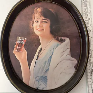 Vintage Coca-Cola tray is a 1973 reproduction of a 1923 advertising design