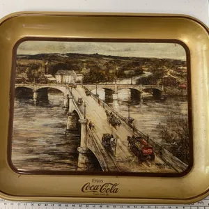 vintage 1984 Coca-Cola metal serving tray featuring a painting by artist Leslie Cope