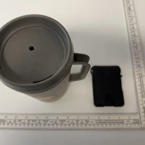 Vintage shell insulated coffee mug and a Furid wallet